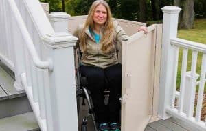 woman in wheelchair using a residential vertical wheelchair platform