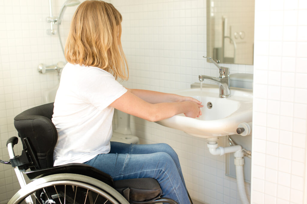 wheelchair accessible bathroom pesdal sink